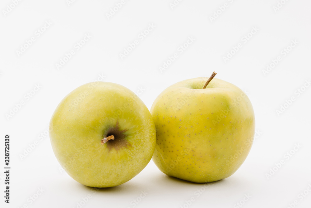 ripe golden delicious apples on white background ripe golden delicious apples on white background