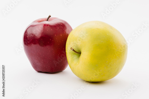 fresh golden and red delicious apples on white background