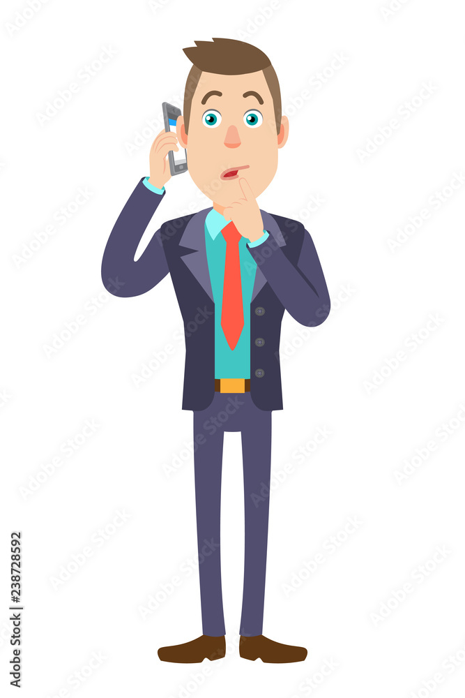 Businessman talking on mobile phone and standing with his finger to his lips Businessman talking on mobile phone and standing with his finger to his lips