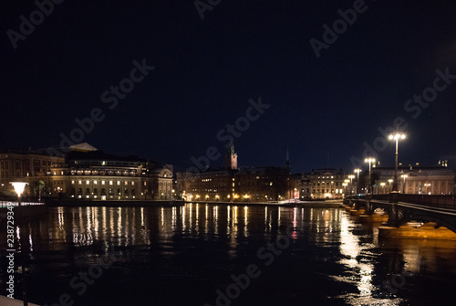 Evening view in Stockholm shilouettes of old town, parliament houses , bridges and lake Mälaren 