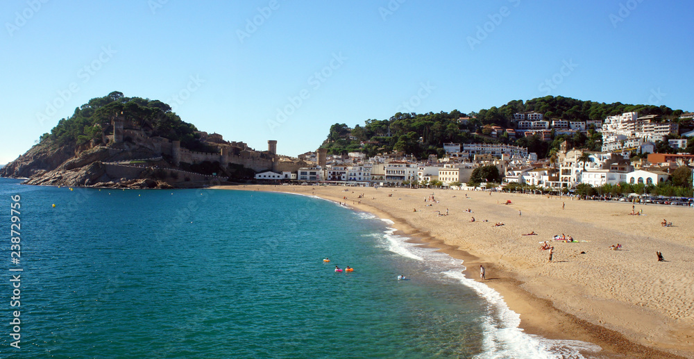The main beach of Tossa de Mar at the end of October.Spain.