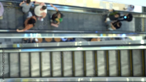 Wallpaper Mural long escalators in modern mall, blur background Torontodigital.ca