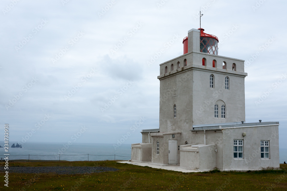 Dyrholaey lighthouse view. South Iceland landmark.