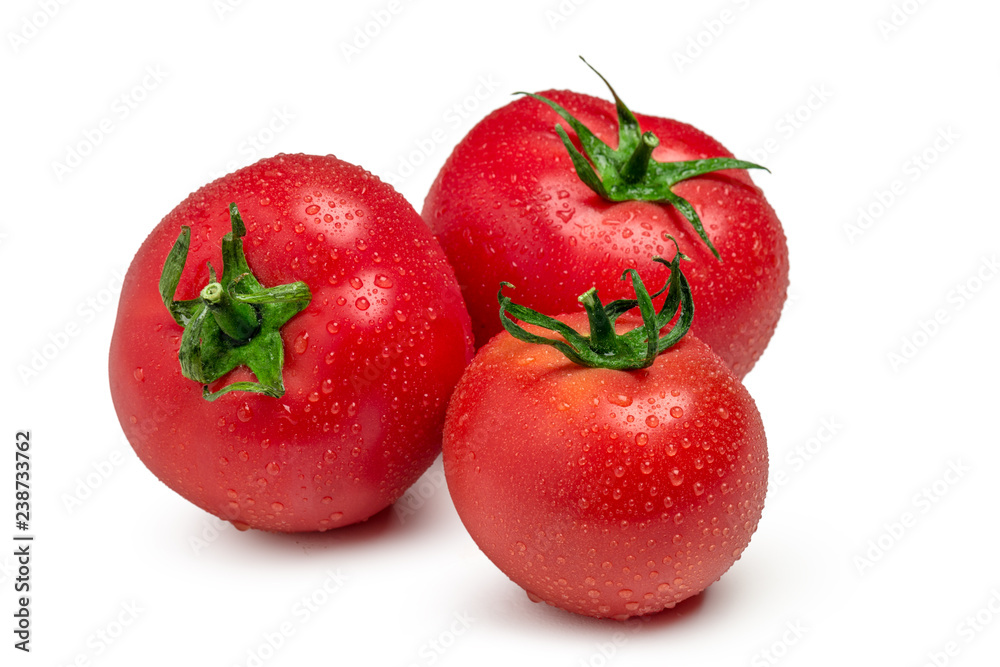 Three ripe  tomatoes isolated on white background