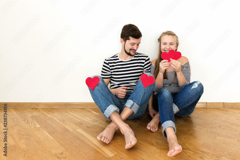Funny young couple is celebraiting valentines day. Funny young couple is celebraiting valentines day.