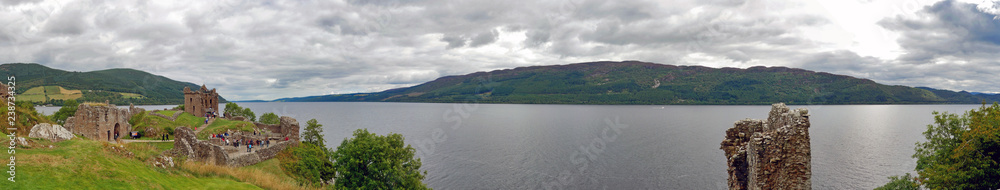 Panoramic view of the Loch Ness with the Urquhart Castle in the foreground