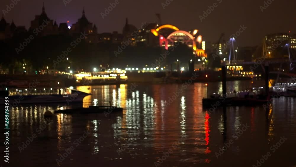 At Night, Ships Pass By The River Near The City. At Night, Ships Pass By The River Near The City.