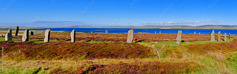 The Ring of Brodgar with Loch of Harray in the background at Mainland, Orkney Islands, Scotland, UK