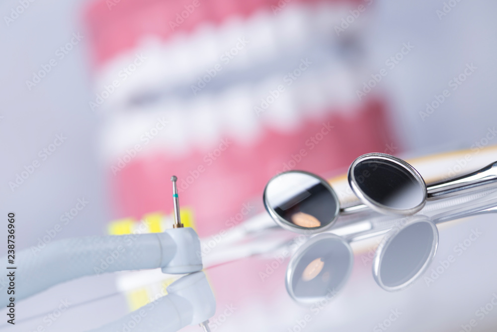 Dentist, Dental tools on a white background, Teeth and jaw. Dentist, Dental tools on a white background, Teeth and jaw.