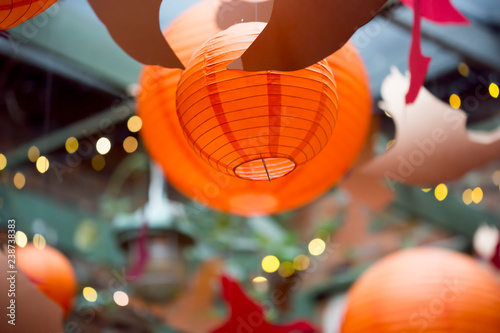 Orange lanterns and paper Halloween decoration 