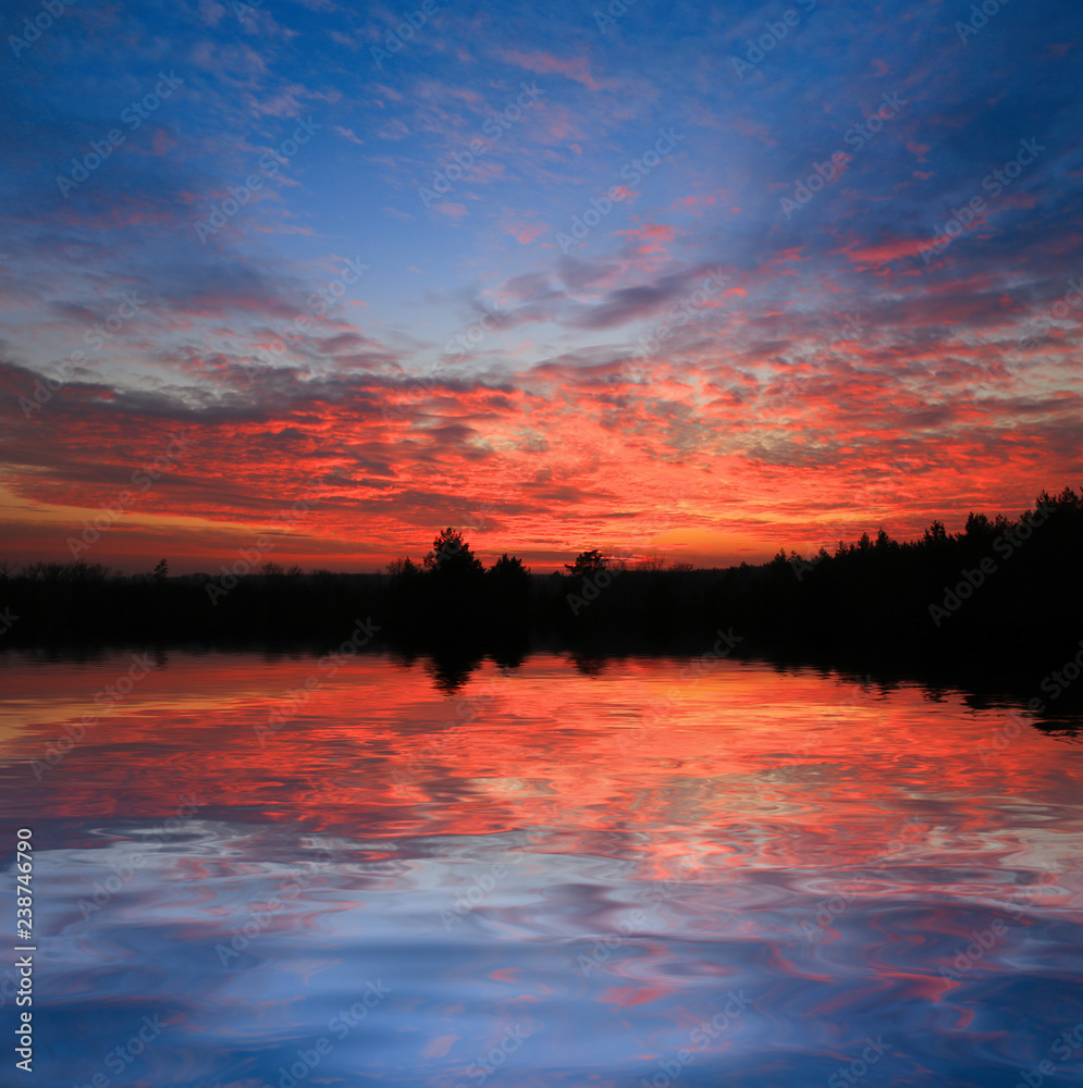 Obraz premium sunset sky over water