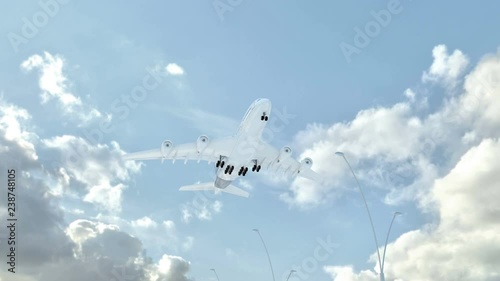 saint vincent and the grenadines, approach of the aircraft to land in low-cloud weather, flying over the name of the country and its flag