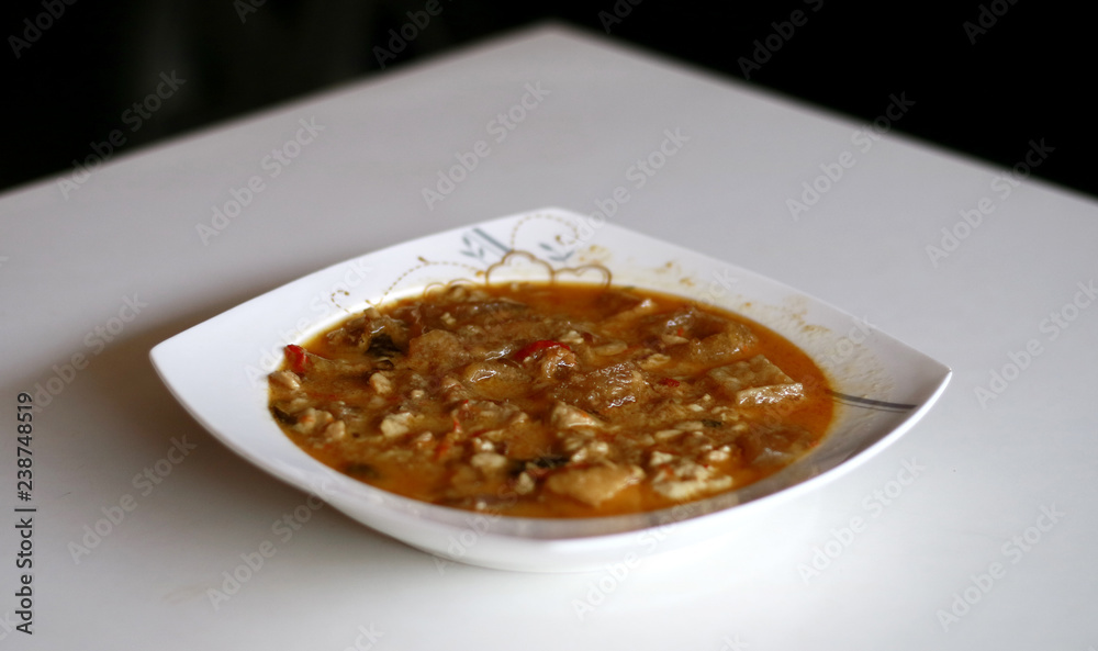 Sambal Tumpang. Tempe in spicy coconut sauce. Kind of sauce which made from old tempe. Indonesian dish. Sambal Tumpang. Tempe in spicy coconut sauce. Kind of sauce which made from old tempe. Indonesian dish.