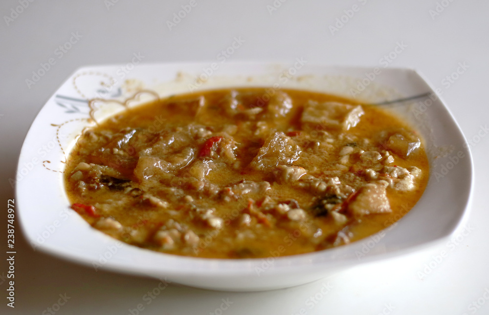 Sambal Tumpang. Tempe in spicy coconut sauce. Kind of sauce which made from old tempe. Indonesian dish. Sambal Tumpang. Tempe in spicy coconut sauce. Kind of sauce which made from old tempe. Indonesian dish.