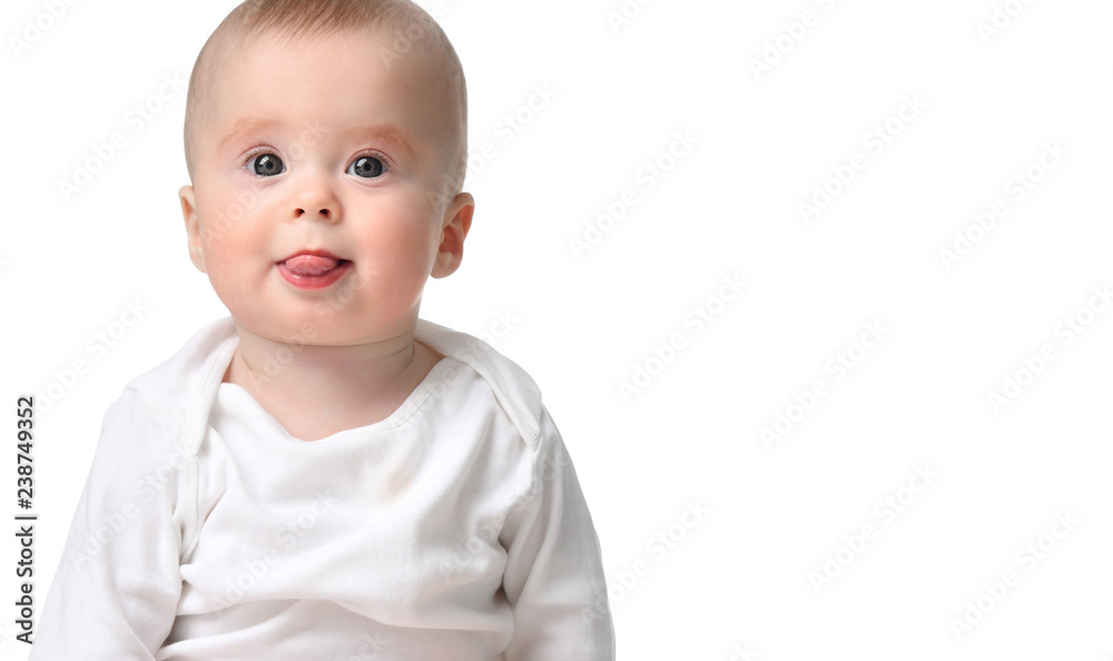 Infant child baby girl toddler sitting in body shirt show tongue isolated on a white. Banner Infant child baby girl toddler sitting in body shirt show tongue isolated on a white. Banner