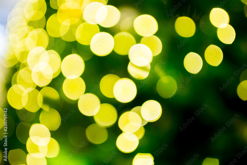 Bokeh from lighting of green christmas tree