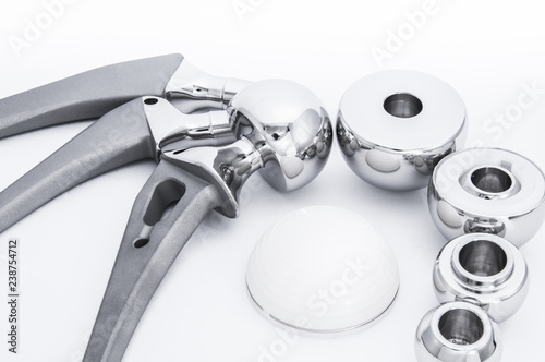 Surgical artificial dentures for hip bone made of stainless steel in white background photo