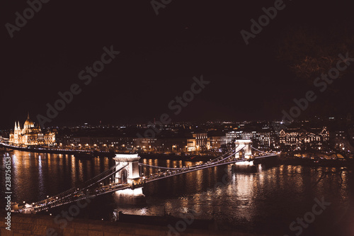View of Chain Bridge and parliament illuminated at night, Budapest, Hungary © EGHStock