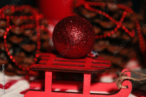 Christmas balls and decorations on red background