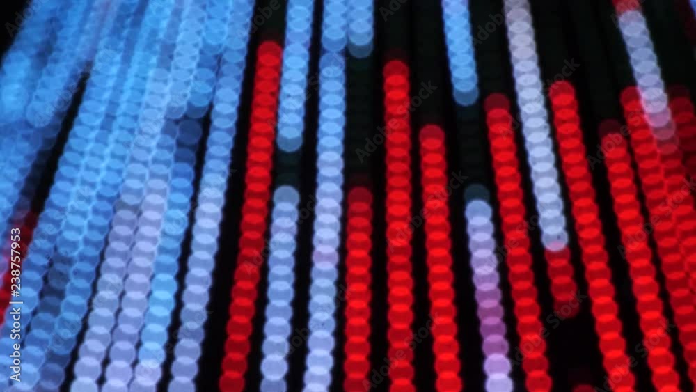 colorful running bokeh lights in the new year night illumination. colorful running bokeh lights in the new year night illumination.