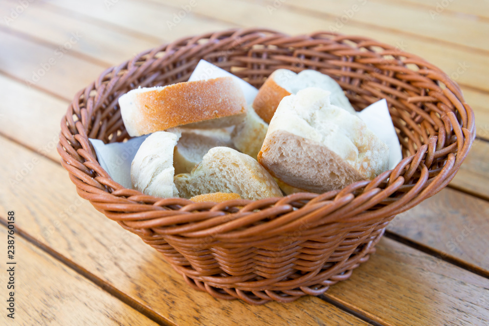 bread in basket - little roll breads in basket on table bread in basket - little roll breads in basket on table
