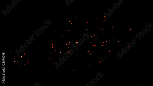 Fire effect dust debris isolated on black background, motion powder spray burst in dark texture