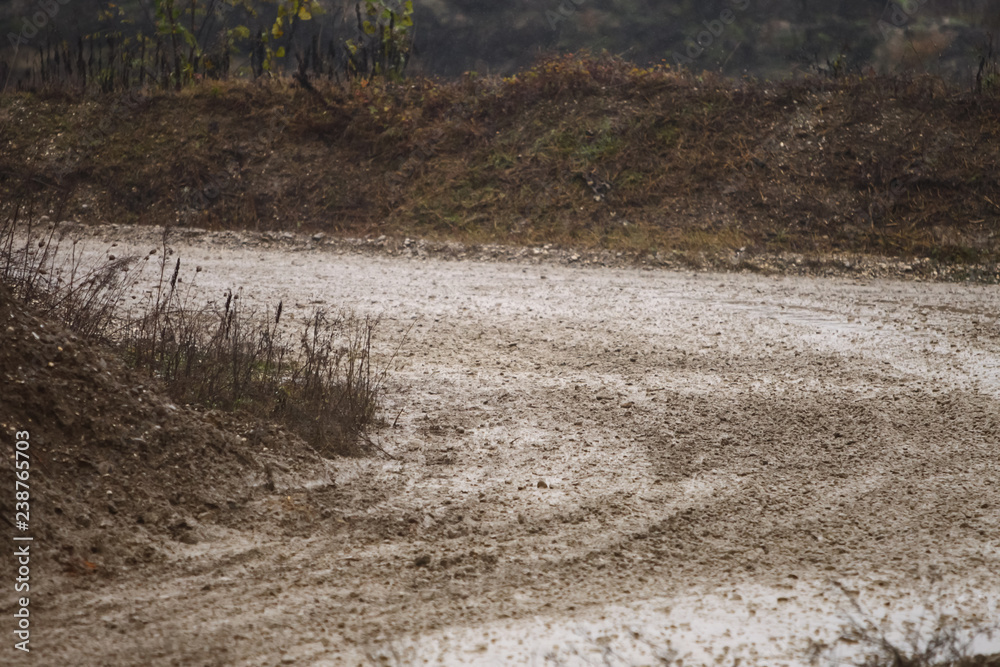 Muddy road in countryside Muddy road in countryside