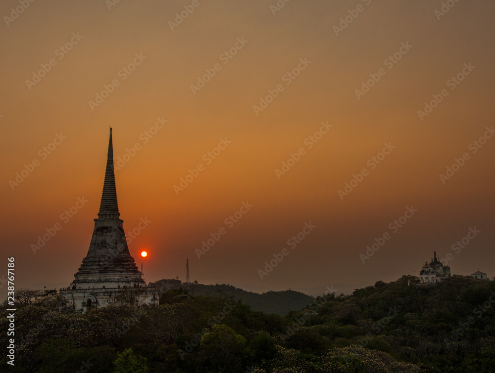 sunset over the mountain with pagoda