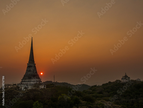 sunset over the mountain with pagoda