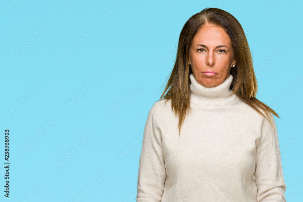 Beautiful middle age adult woman wearing winter sweater over isolated background depressed and worry for distress, crying angry and afraid. Sad expression. Beautiful middle age adult woman wearing winter sweater over isolated background depressed and worry for distress, crying angry and afraid. Sad expression.