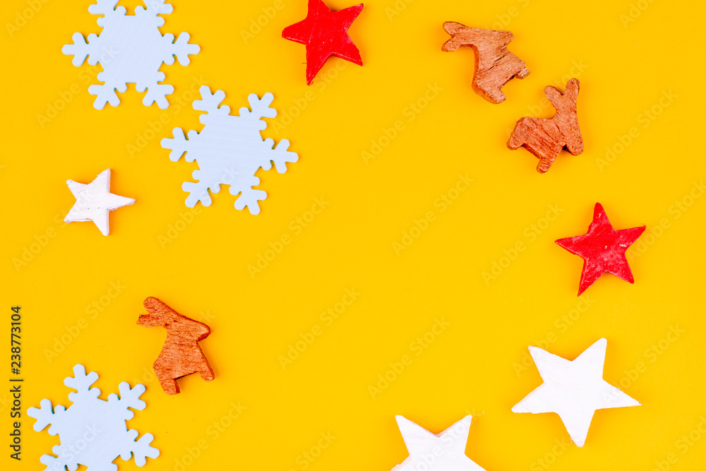 Christmas composition. Christmas yellow decorations, fir tree branches with toys gift boxes on yellow background. Flat lay, top view, copy space Christmas composition. Christmas yellow decorations, fir tree branches with toys gift boxes on yellow background. Flat lay, top view, copy space