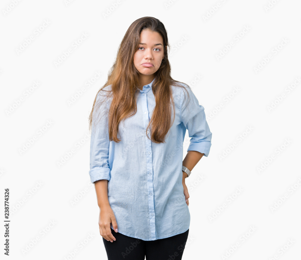 Young beautiful brunette business woman over isolated background depressed and worry for distress, crying angry and afraid. Sad expression. Young beautiful brunette business woman over isolated background depressed and worry for distress, crying angry and afraid. Sad expression.