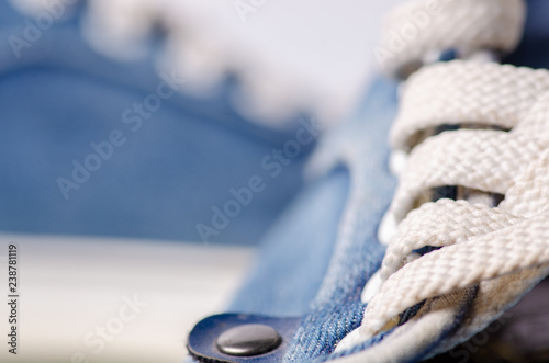 Jeans sneakers shoes laces macro blur background