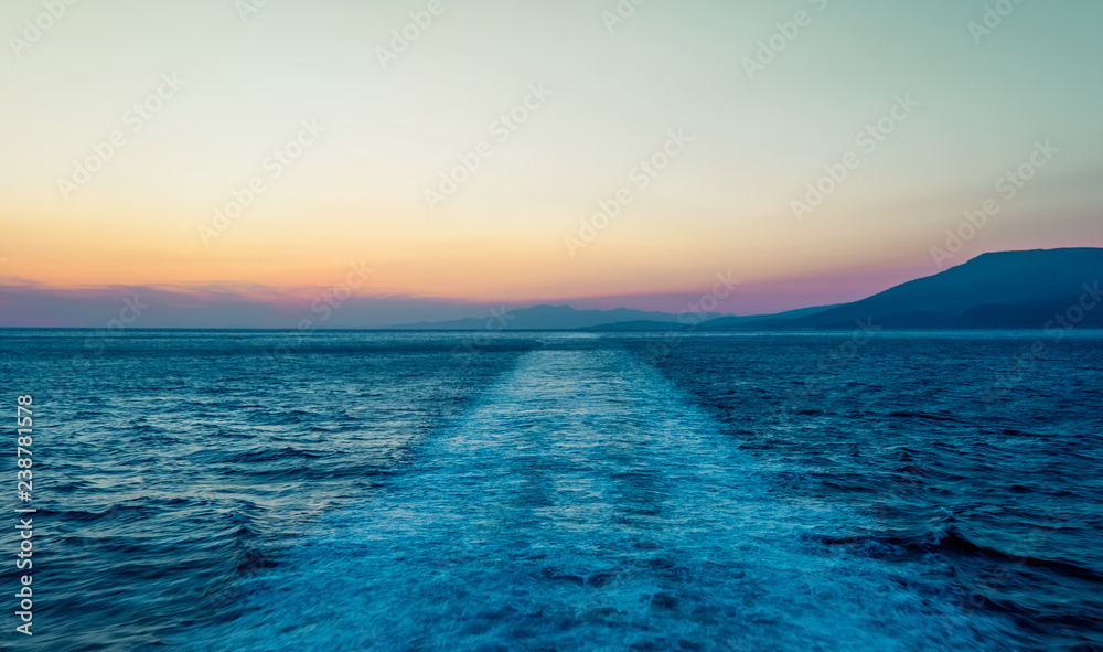 Fototapeta premium Track from cruise ship at sunset