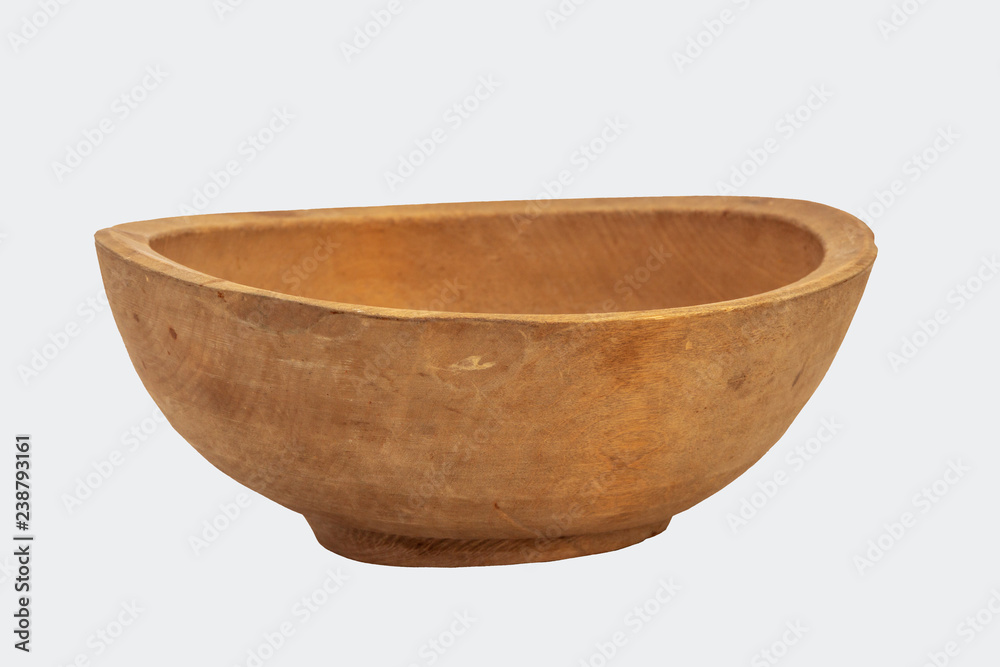 large homemade empty wooden bowl on a white background large homemade empty wooden bowl on a white background