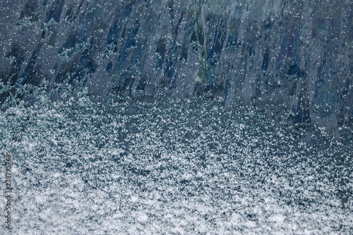 the texture of the snow,the frozen glass of the car