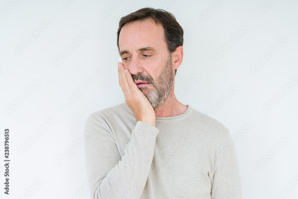 Elegant senior man over isolated background thinking looking tired and bored with depression problems with crossed arms. Elegant senior man over isolated background thinking looking tired and bored with depression problems with crossed arms.