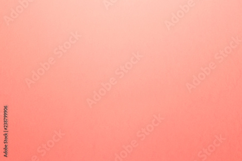 Abstract Coral background. Bright halftone pattern. Light paper texture for luxury elegant backdrop design wallpaper or template. Living Coral color of the Year 2019 photo