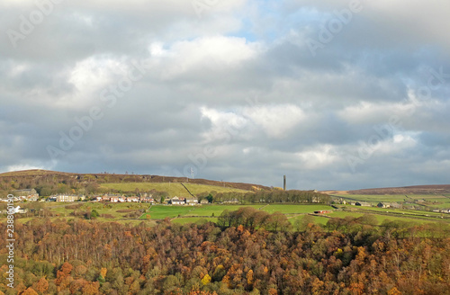 panoramic view of the wadworth and chiserley villages of calderdale in west yorkshire with autumn pennine landscape with fields and farms with midgley moor in the distance photo