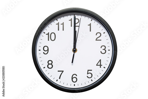 Wall clock shows time 12 o'clock on white isolated background. Round wall clock - front view. Twelve o'clock