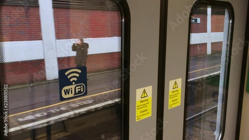 Train leaving English station, view from train. photo