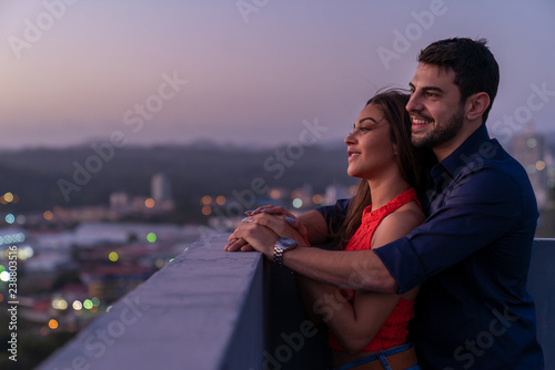 Couple Share Romantic Moment During Sunset in Rooftop