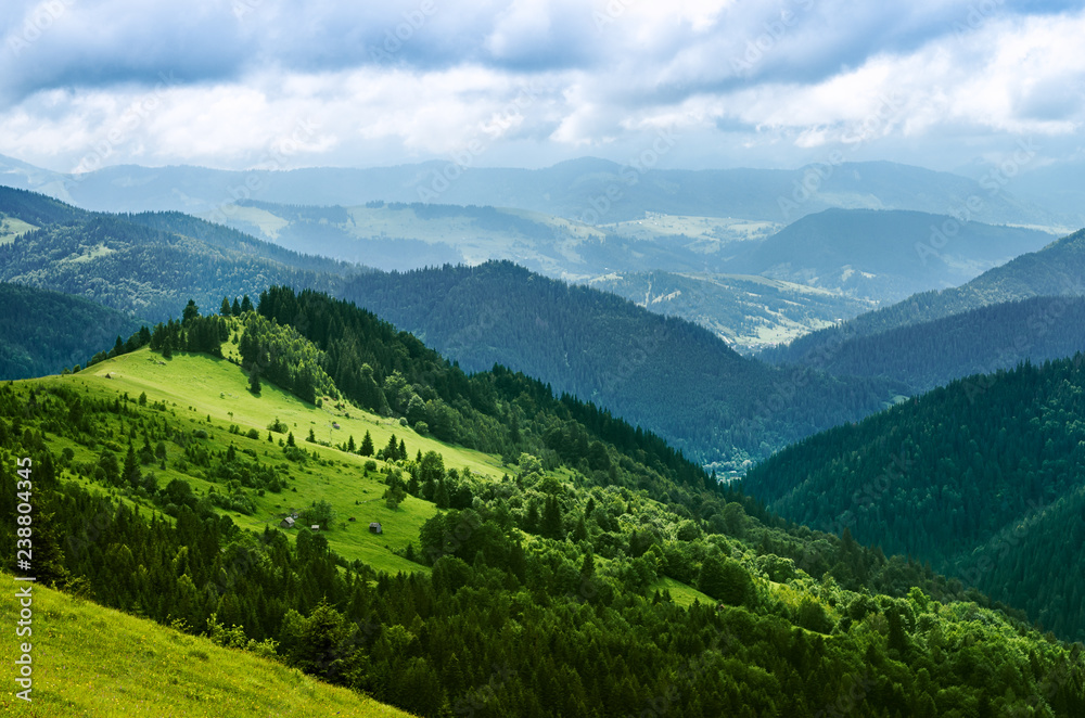 Landscape from height to mountain slopes, meadow. Carpathians Ukraine.