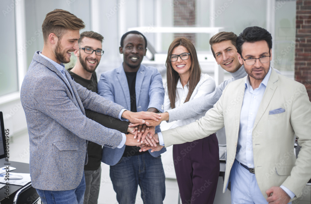 business team shows their unity business team shows their unity