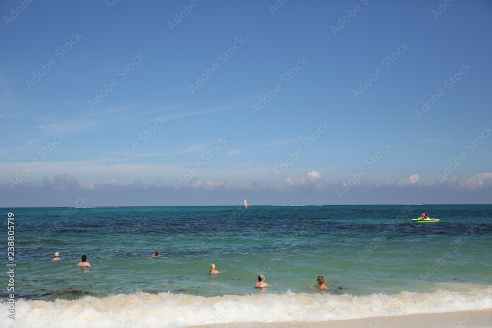blue sea with a sailboat and boat, and swimmers, and the beach, with white sand. Summer concept background - Sea or Ocean Beach Wallpaper, postcard
