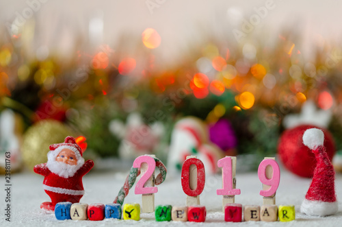 Decorative Christmas/New Year composition with snow.Colorful message: Happy new year