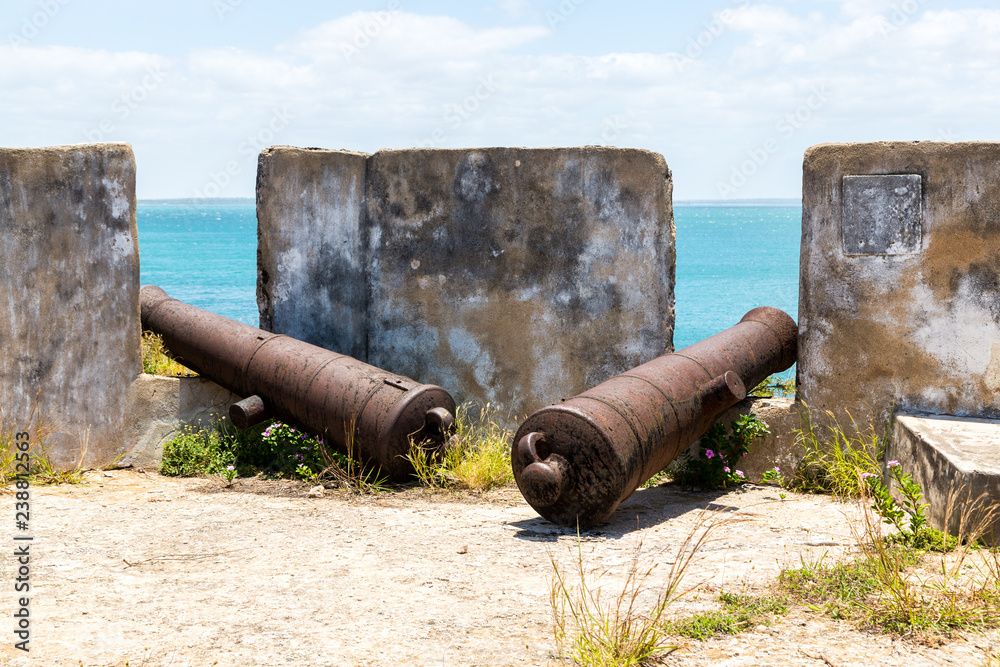 Two old cannons of Fort San Sebastian guard Mozambique island (Sao Sebastiao, São Sebastião, Ilha de Mocambique), Indian ocean coast, Mozambique. Mossuril Bay, Nampula. Portuguese East Africa