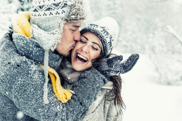 happy love couple in winter 
