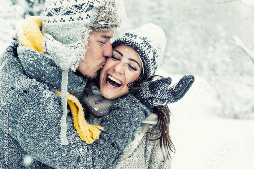 happy love couple in winter 