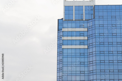 modern building with blue sky and clouds